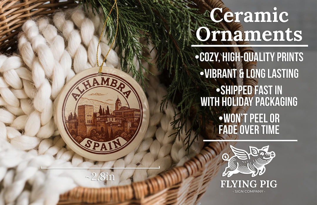 Ceramic ornaments, including a round ornament with a picture of Alhambra, Spain, hanging from a wicker basket.