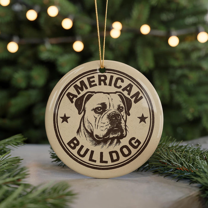 A circular ornament with the text "AMERICAN BULLDOG" and a graphic of a bulldog's head, hanging from a string.