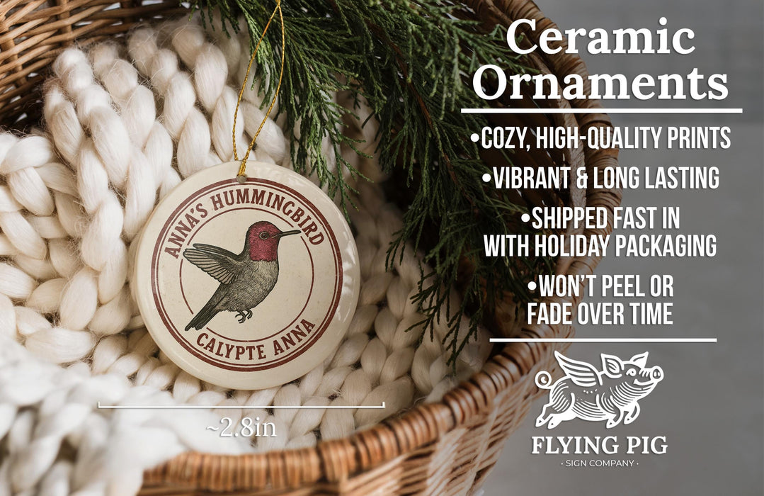 Ceramic ornaments, featuring a ceramic ornament with a hummingbird design, are displayed in a woven basket.