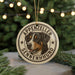 A circular ornament featuring a close-up of a dog's face, with the text "APPENZELER SENNENHUND" around the edge.