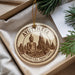 A circular ornament with a Buddha image and the text "AYUTTHAYA HISTORICAL PARKTARK THAILAND" is displayed in a box with pine branches.
