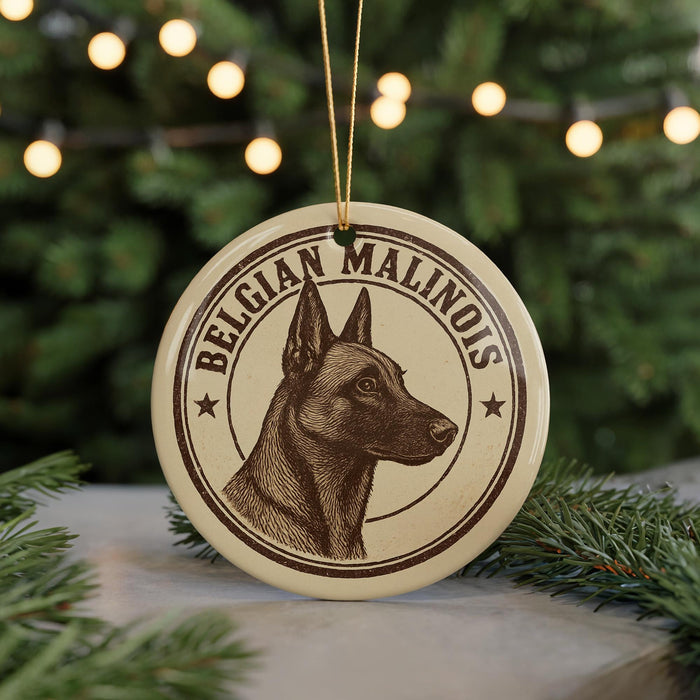 A circular ornament featuring a close-up of a Belgian Malinois dog's head, with the text "Belgian Malinois" prominently displayed.