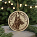 A circular ornament featuring a close-up of a Belgian Malinois dog's head, with the text "Belgian Malinois" prominently displayed.