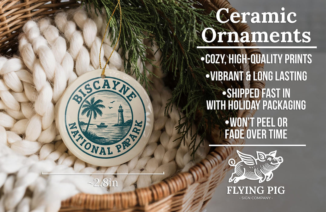 Ceramic ornaments, specifically a Biscayne National Park ornament, are displayed in a woven basket.