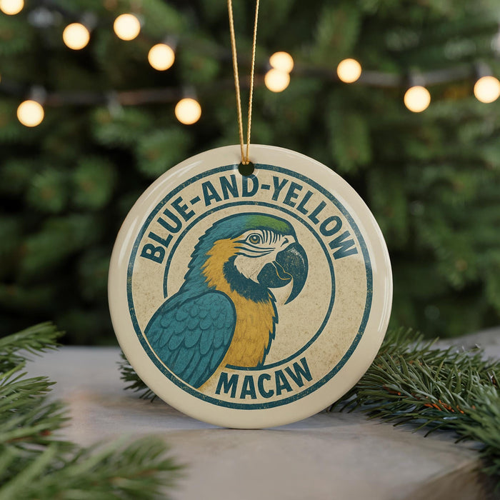 A circular ornament with a parrot design, featuring the text "BLUE-AND-YELLOW MACAW" around the edge.
