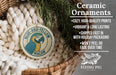 a ceramic ornament with a bird design, placed in a basket filled with yarn. The ornament has a blue and yellow color scheme and is described as a "Ceramic Ornament" with various features such as "Cozy, High-quality Prints", "Vibrant & Long Lasting", "Shipped Fast in with Holiday Packaging", and " Won't Peel or Fade Over Time".