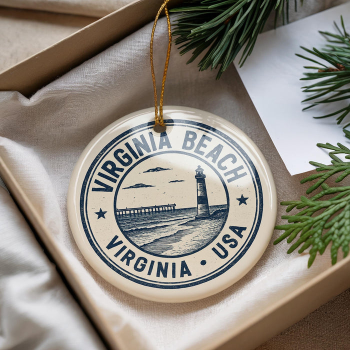 A decorative ornament with a lighthouse and the text "VIRGINIA BEACH USA" is displayed in a box, surrounded by pine branches.