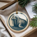 A circular ornament featuring a walrus with large tusks, hanging from a string.