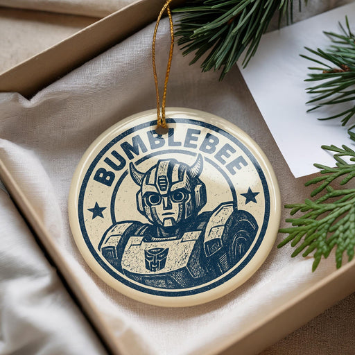A circular ornament featuring a Bumblebee character from the Transformers franchise, with the text "BUMBLEBE" prominently displayed.