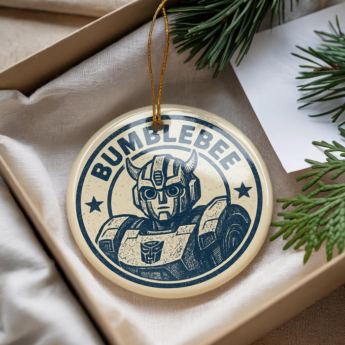 A circular ornament featuring a Bumblebee character from the Transformers franchise, with the text "BUMBLEBE" prominently displayed.