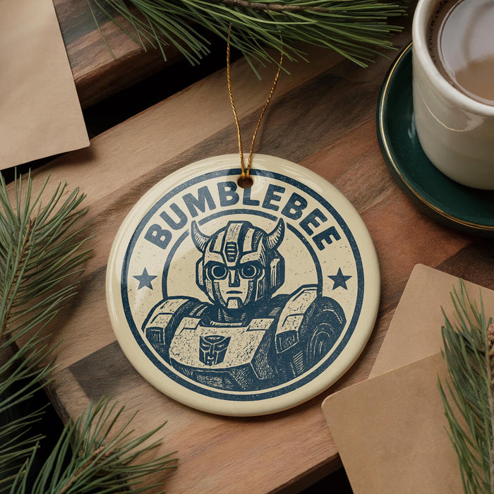 A circular ornament featuring a Bumblebee character from the Transformers franchise, with the text "BUMBLEBE" prominently displayed.