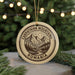 A circular ornament with the text "CARPATHIAN MOUNTAINS ROMANIA" and an illustration of a mountain landscape with pine trees and a river.