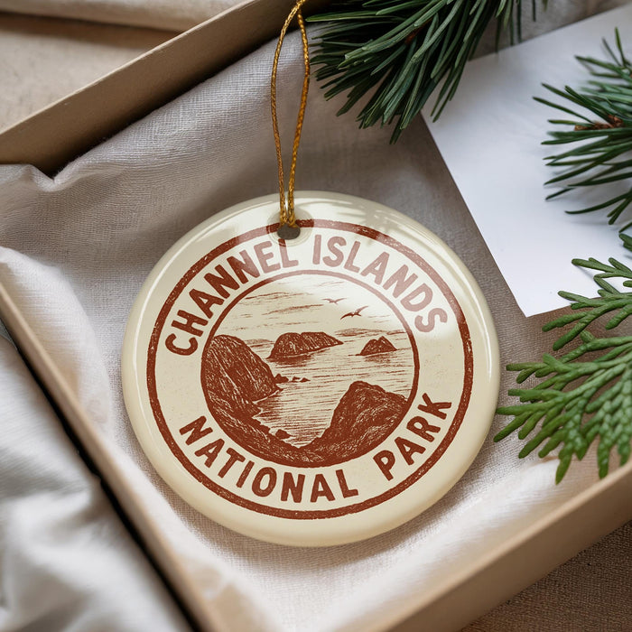 A round ornament with the text "CHANNEL ISLANDS NATIONAL PARK" printed on it, hanging from a string.