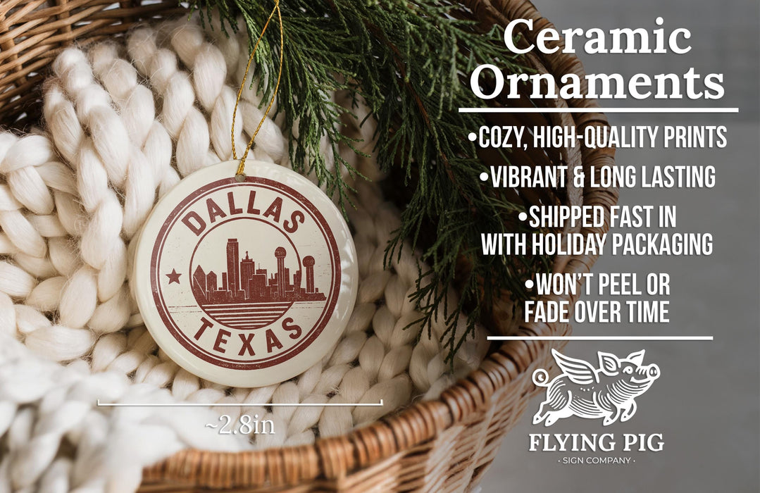 Ceramic ornaments, specifically a Dallas, Texas-themed ornament, are displayed in a woven basket.