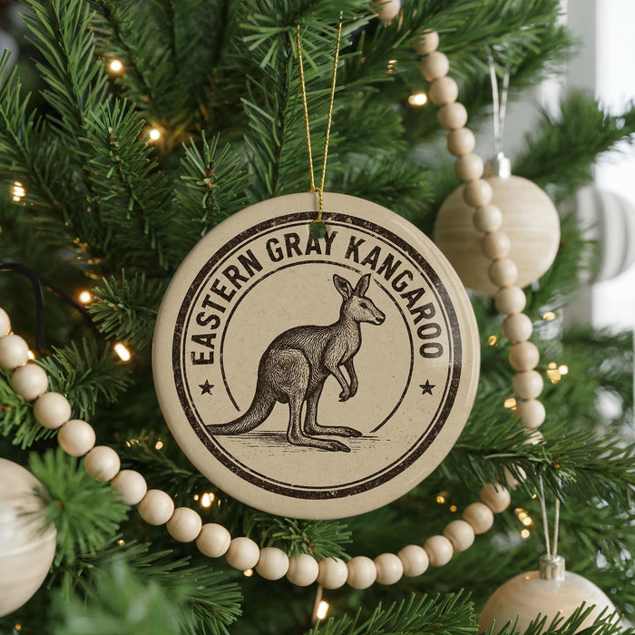 A Christmas tree decorated with ornaments, including a circular ornament with a kangaroo illustration and the text "EASTERN GRAY KANGAROO".