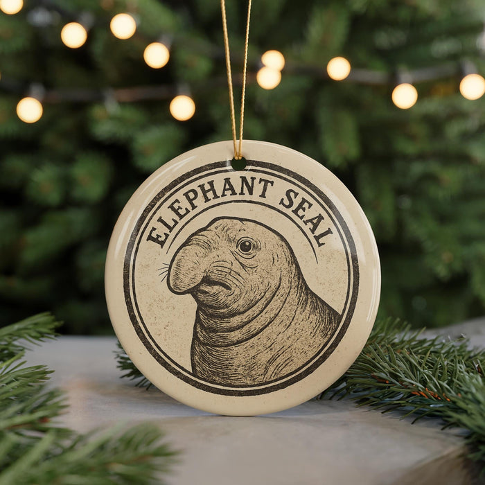 A circular ornament featuring an illustration of an elephant seal, with the text "Elephant Seal" prominently displayed.