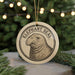 A circular ornament featuring an illustration of an elephant seal, with the text "Elephant Seal" prominently displayed.