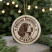 A circular ornament featuring the head of an English Springer Spaniel dog, with the text "English Springer Spaniel" and "Spaniel" printed on it.