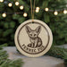 A circular ornament featuring a fennec fox, a small desert fox, with the text "Fennec Fox" printed on it.