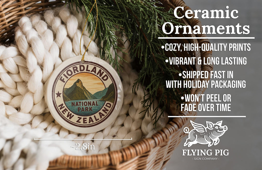 Ceramic ornaments, featuring a design of Fiordland National Park, are displayed in a woven basket.