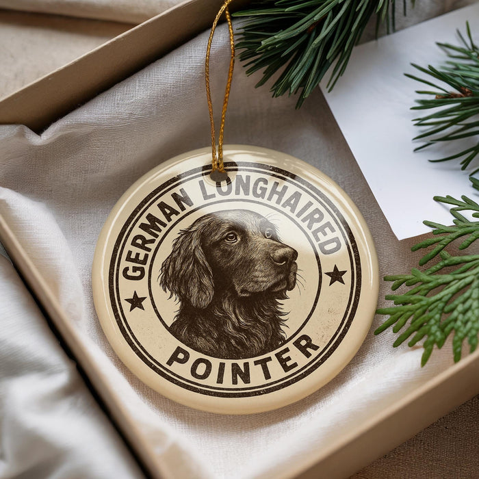 A round ornament with a German Longhaired Pointer dog image and the text "German Longhaired Pointer" printed on it, hanging from a string.