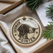 A round ornament with a black and white illustration of a German Shorthaired Pointer dog, surrounded by text that reads "German Shorthaired Pointer".