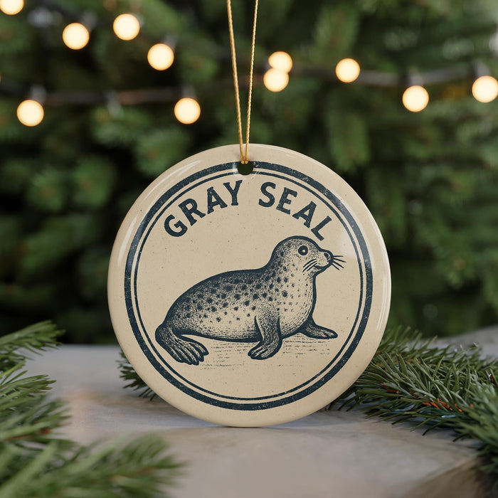 A circular ornament featuring a seal, with the text "GRAY SEAL" around the edge.