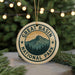A circular ornament with the text "GREAT BASIN NATIONAL PARK" and a mountain landscape design, hanging from a string.