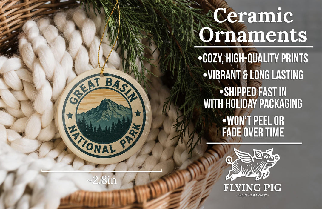 a ceramic ornament hanging from a wicker basket, with a pine tree branch and greenery in the background.