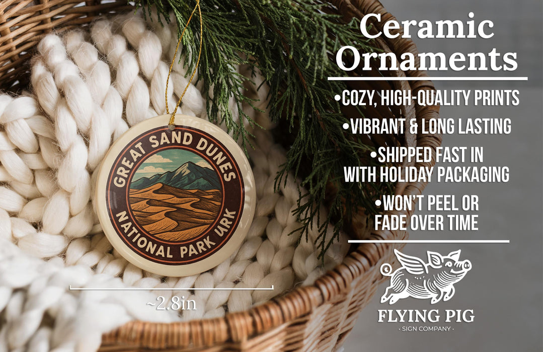 Ceramic ornaments, Great Sand Dunes National Park, and pine branches are displayed in a woven basket.
