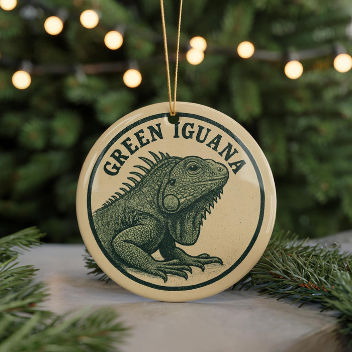 A circular ornament featuring a green iguana, with the text "GREEN Iguana" written around the edge.