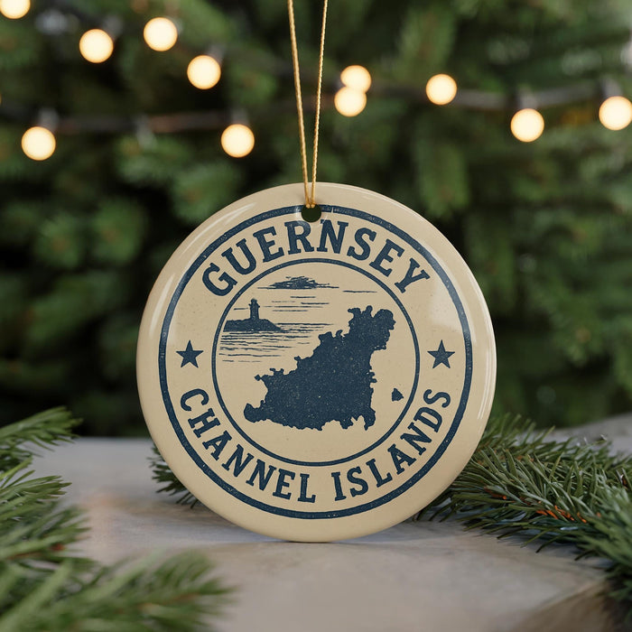 A circular ornament with the text "GUERNSEY CHANNEL ISLANDS" and a graphic of a map of the Channel Islands, hanging from a string.