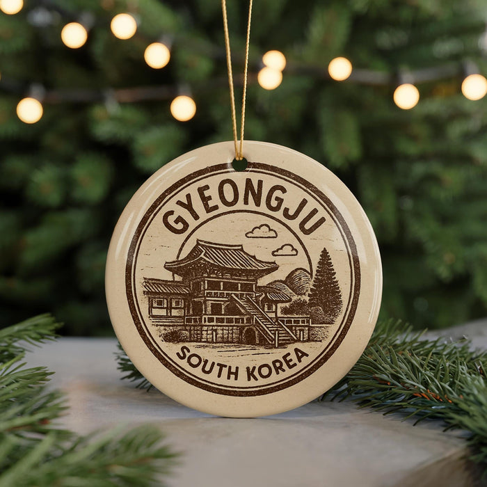 A circular ornament with a design depicting a traditional Korean temple, surrounded by Christmas lights and greenery.