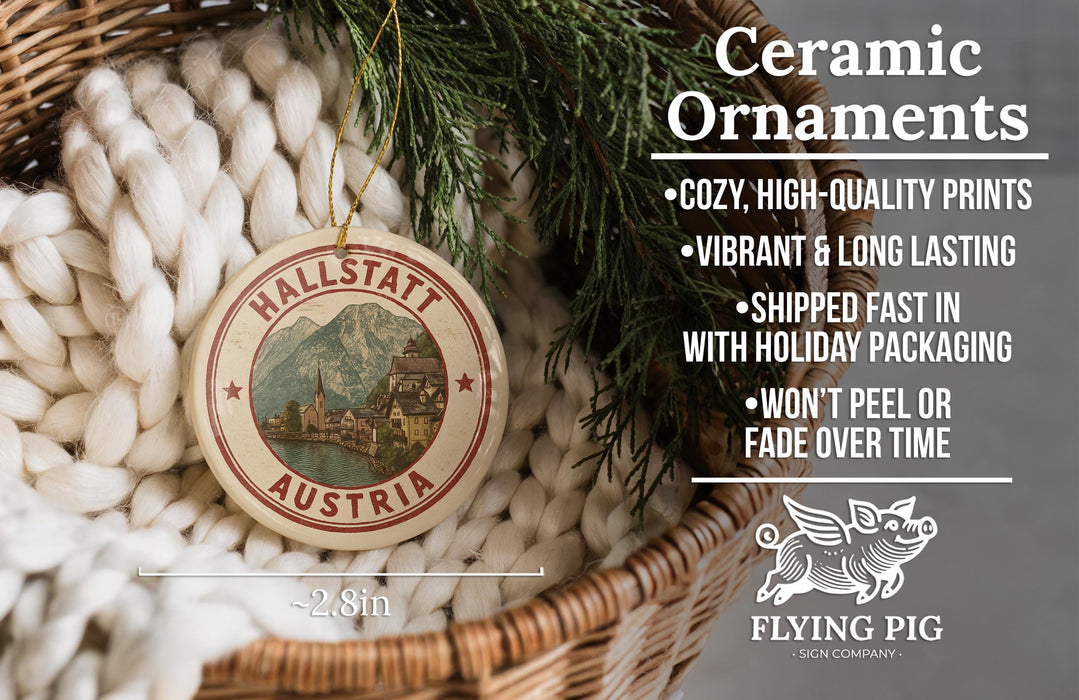 Ceramic ornaments, specifically Hallstatt Austria ornaments, are displayed in a basket with pine branches. The text highlights the ornaments as "cozy, high-quality prints" and "vibrant & long lasting", with a description of their shipping speed and packaging. The image also includes a logo for "Flying Pig" and a scale indicating the size of the ornaments.