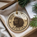 A circular ornament featuring an illustration of an Irish Water Spaniel dog, with the text "Irish Water Spaniel" printed on it.