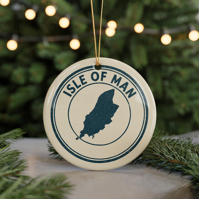 A circular ornament with the text "ISLE OF MAN" and a graphic of the island of Man, surrounded by a string of lights.