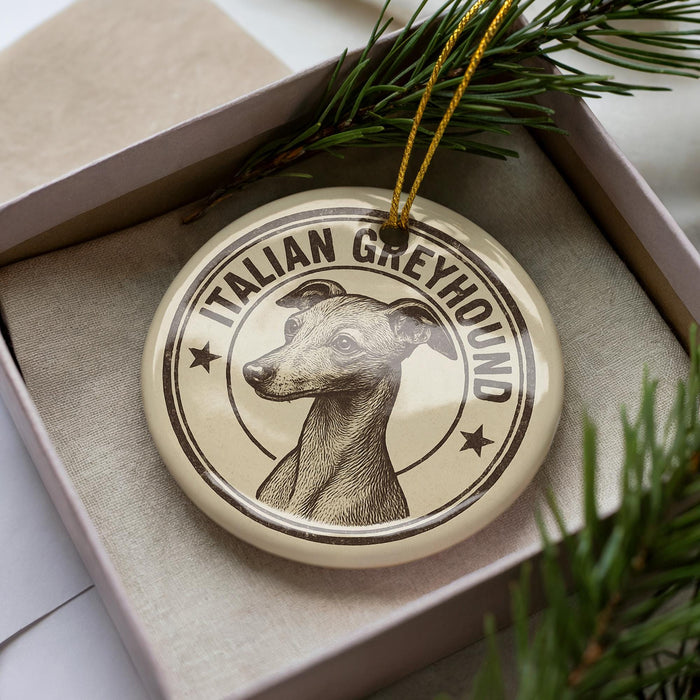 A circular ornament featuring an illustration of an Italian Greyhound dog, with the text "Italian Greyhound" written around the edge.