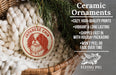 Ceramic ornaments featuring a Japanese Chin dog, with a wicker basket and greenery in the background.