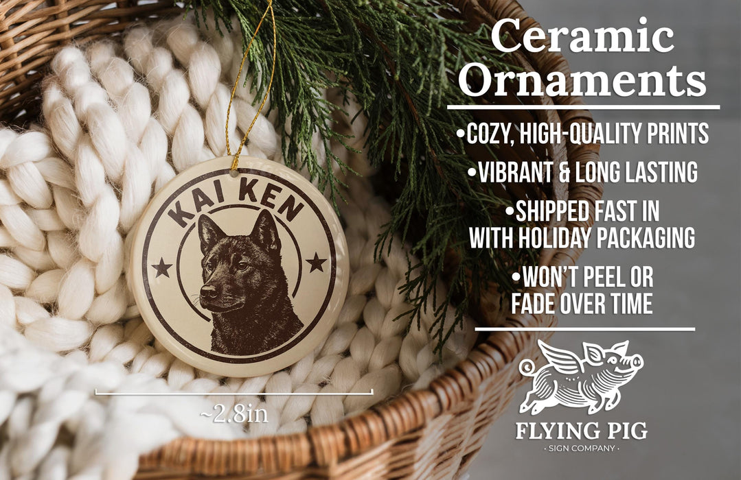 a ceramic ornament hanging from a wicker basket, with a pine branch and greenery in the background.