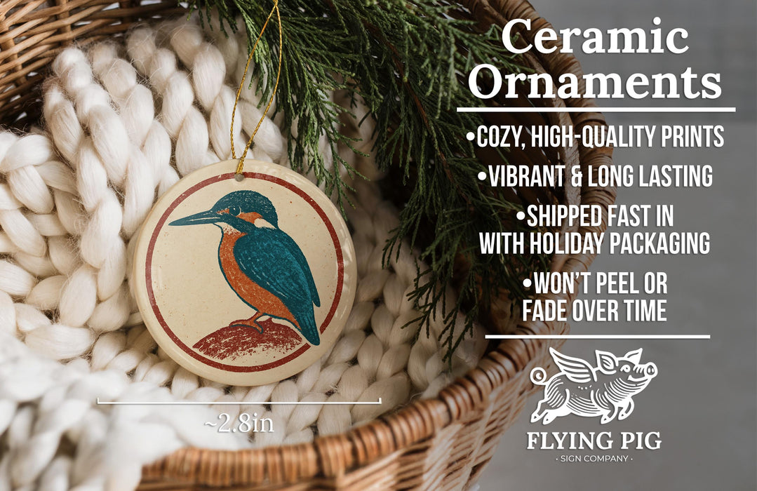 Ceramic ornaments, featuring a ceramic bird ornament with a red and blue design, are displayed in a wicker basket.