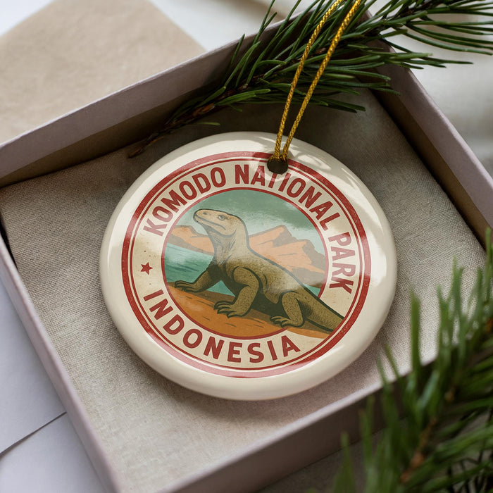 A circular ornament with the text "KOMODO NATIONAL PARK INDONESIA" printed on it, featuring an illustration of a Komodo dragon.