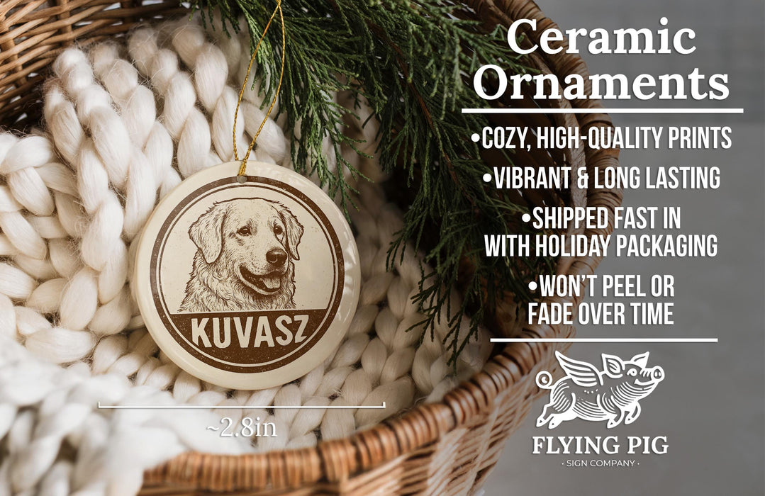 Ceramic ornaments, featuring a ceramic dog ornaments with the name "KUVASZ" and a wicker basket with pine branches.