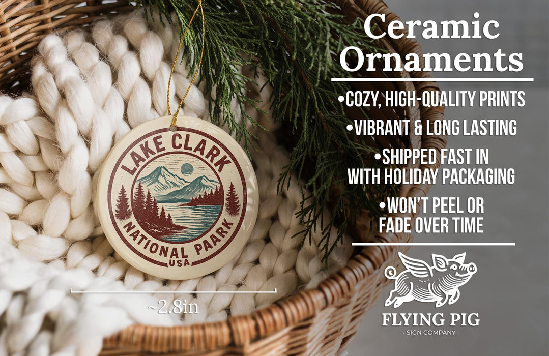 Ceramic ornaments, featuring a Lake Clark National Park ornament, are displayed in a wicker basket.