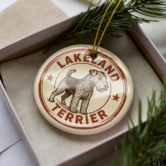 A circular ornament with the text "LAKELAND TERRIER" printed on it, featuring a dog illustration.
