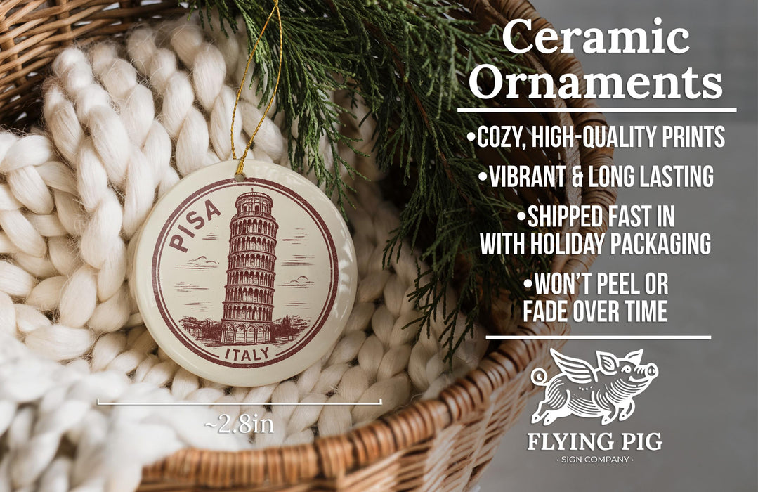 Ceramic ornaments, featuring a design of the Tower of Pisa in Italy, are displayed in a woven basket.