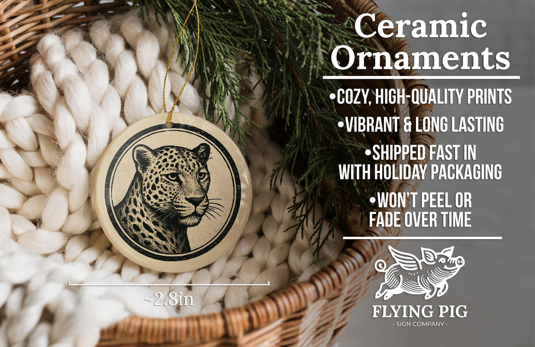 Ceramic ornaments, featuring a leopard print design, are displayed in a wicker basket.