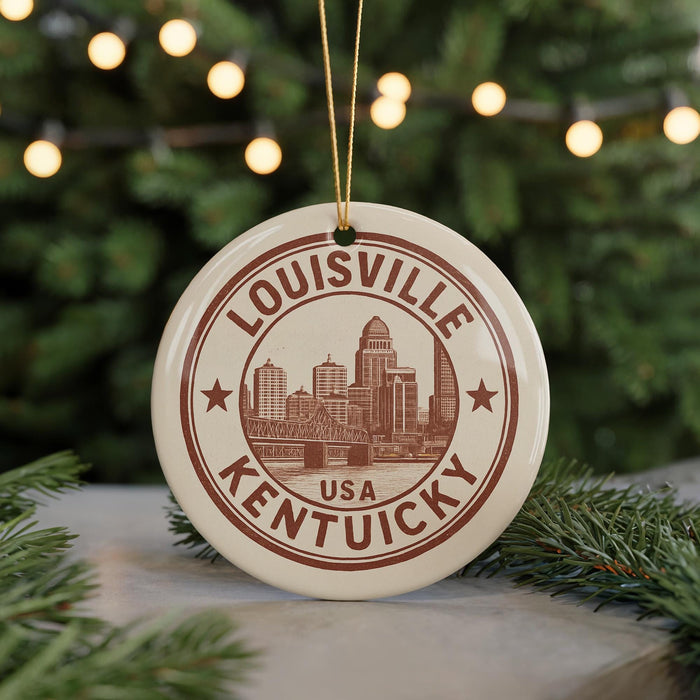A circular ornament with the text "LOUISVILLE KENTUCKY USA" printed on it, featuring an illustration of a city skyline.