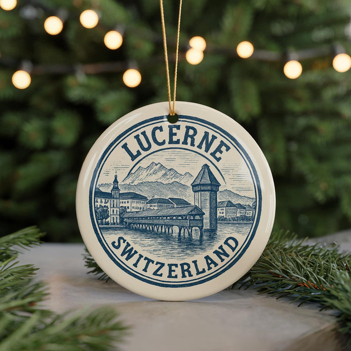 A round ornament with the word "LUCERNE" and "SWITZERLAND" printed on it, hanging from a string.