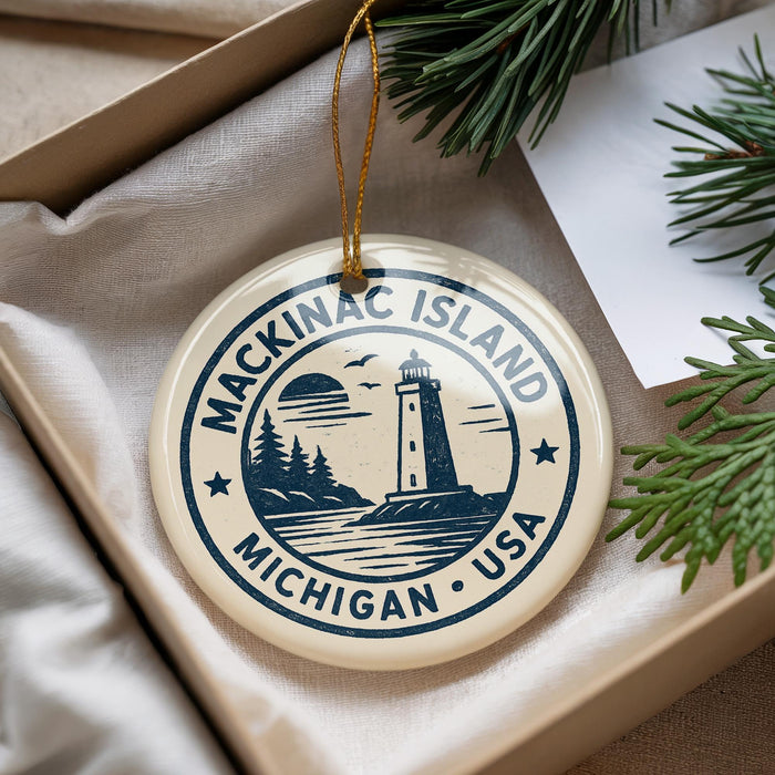 A decorative ornament with the text "Mackinac Island, Michigan, USA" on it, hanging from a string.