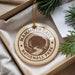 A circular ornament with the text "MAMMOTH CAVE NATIONAL PARK" printed on it, hanging from a string.